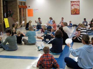 Gari Stein with a group of children and adults